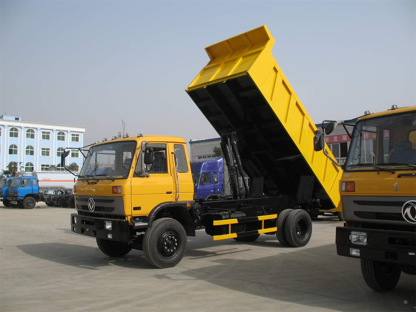 front loading dumper truck, fungsi dump truck